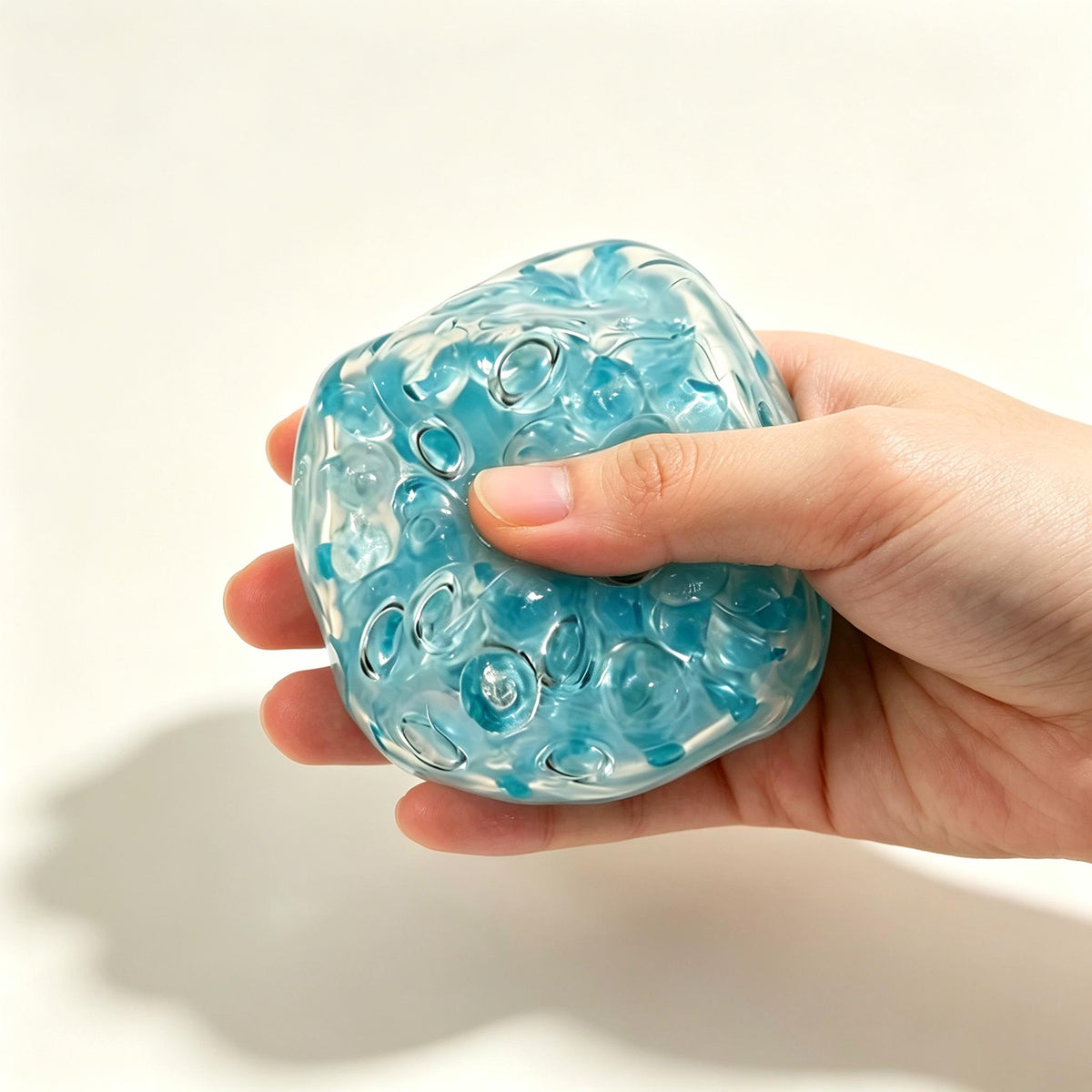 Textured Squishy Ball – Bumpy Bead Fidget for Stress Relief, Clear Sensory Squeeze Toy for Adults & Kids, 4 Colors