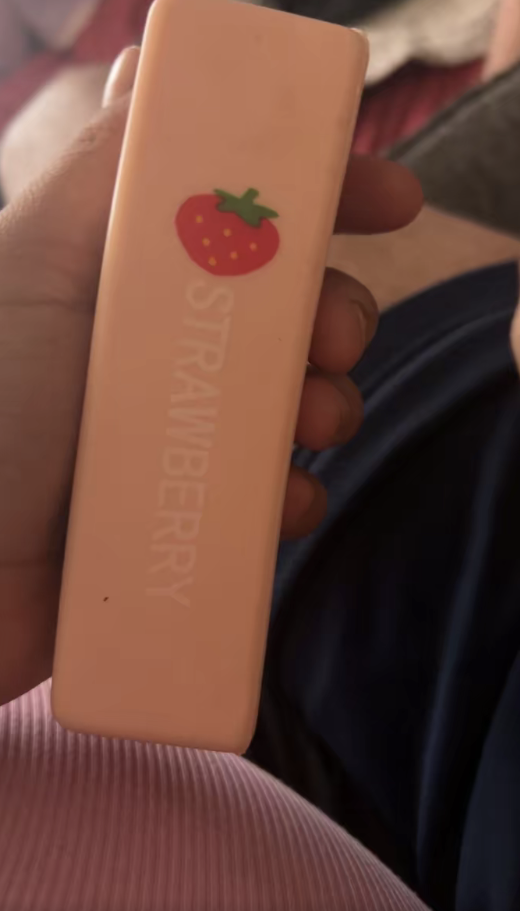 Customer photos of a strawberry squishy