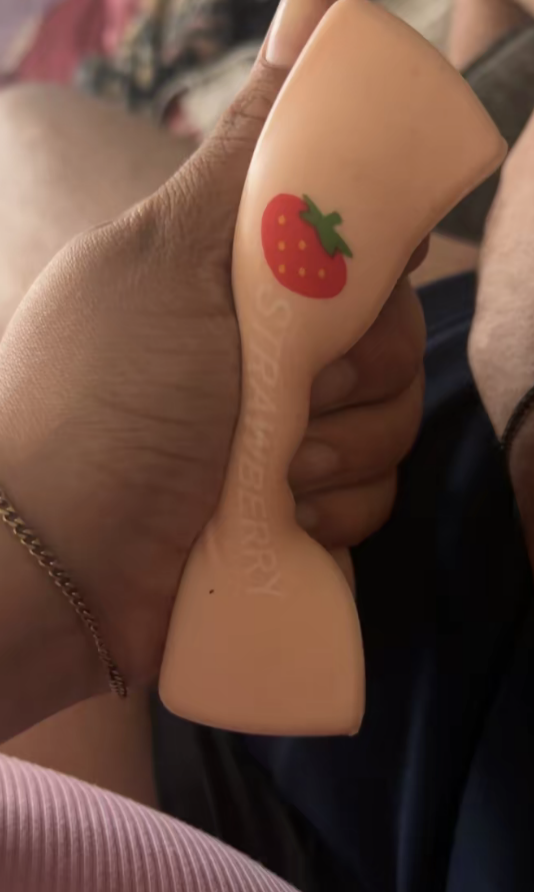 Customer photos of a strawberry squishy
